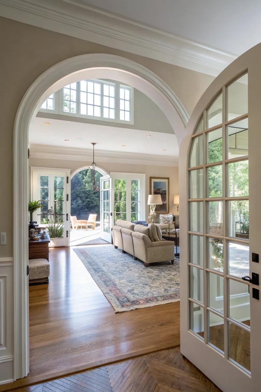 An archway entrance refining the unrestricted scheme progression within a harmonious residing space.