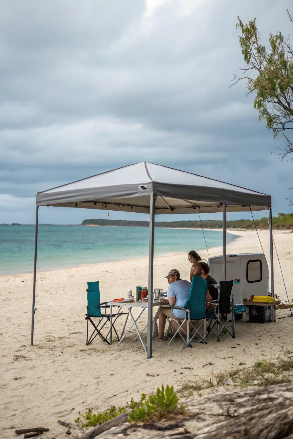 Mobile awnings provide extensive shade for beach picnics.