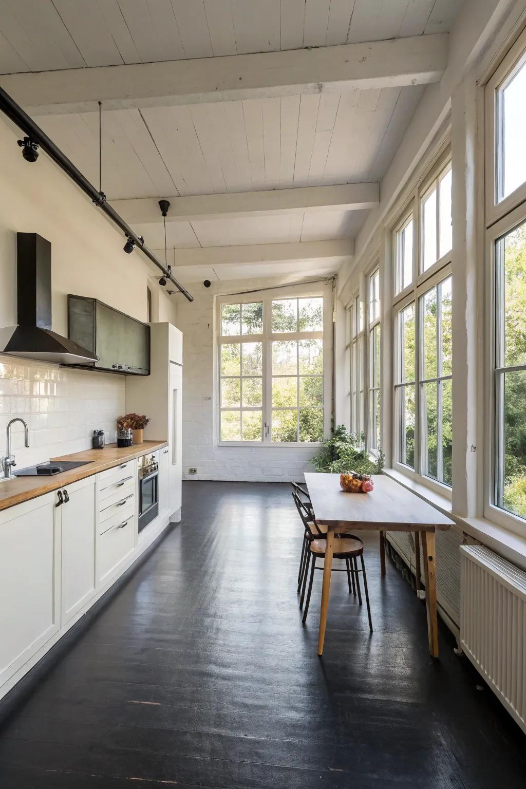 An unrestricted culinary space arrangement where ebony flooring assumes center stage.