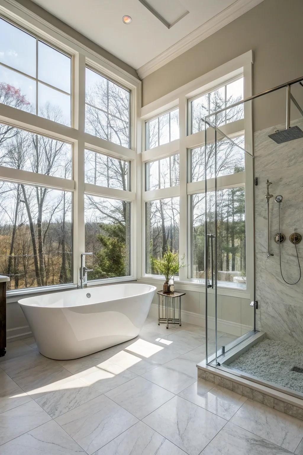 A primary bathroom awash in sunlight from expansive windows.