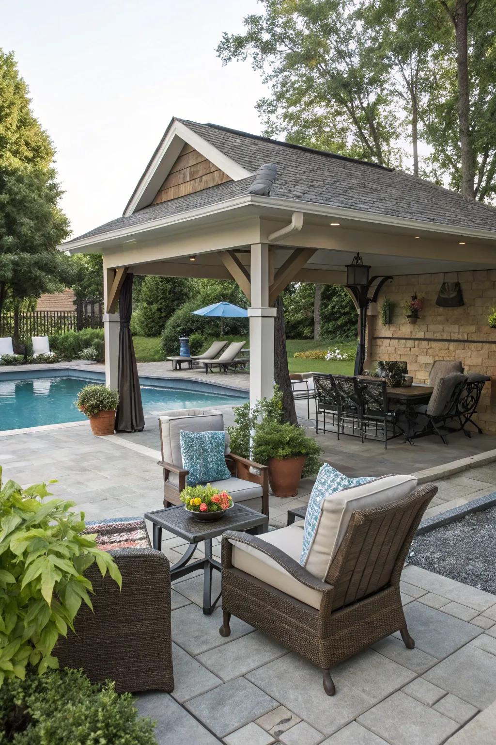 A practical pool house with shaded patios and comfortable lounging options.