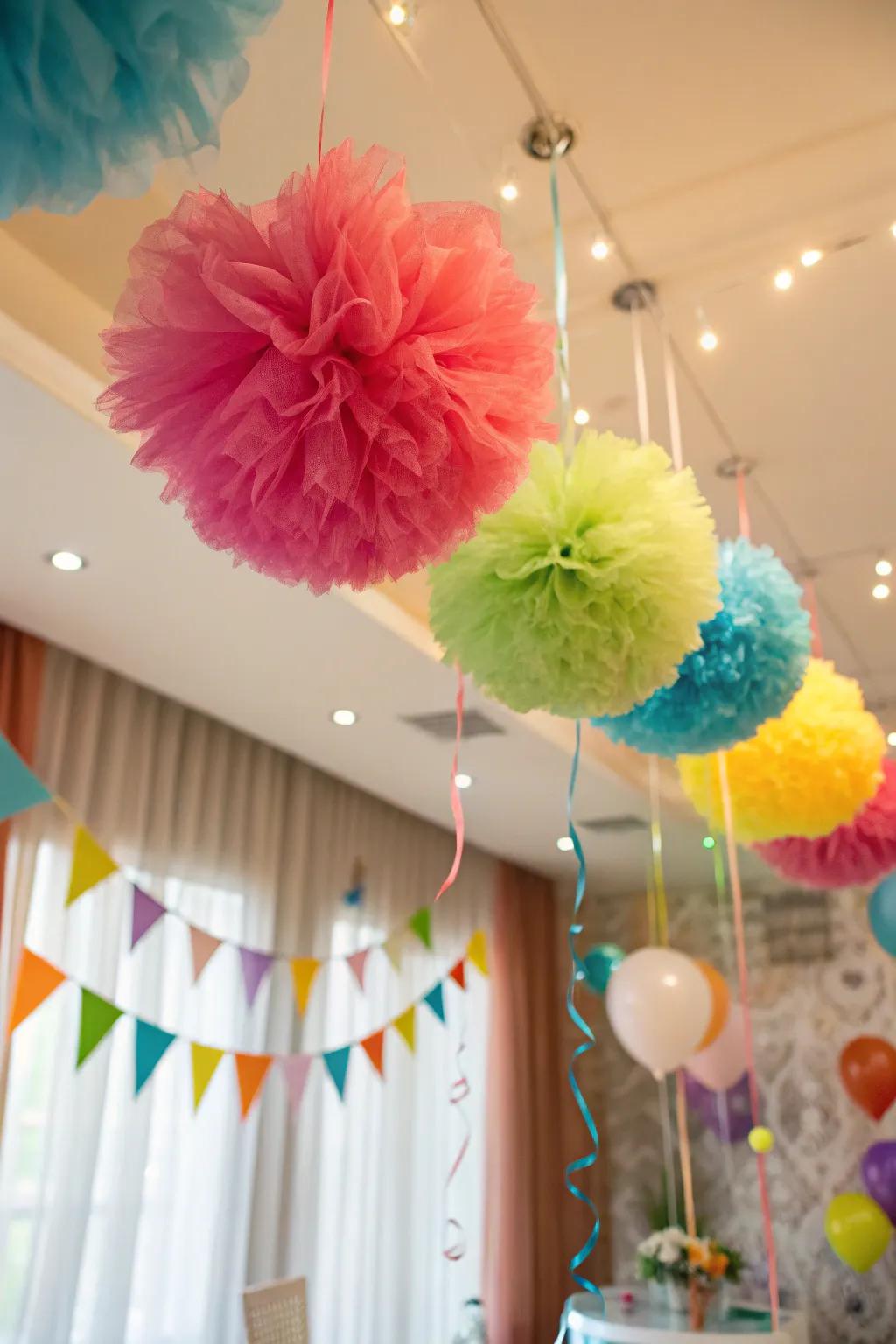 Infuse a sense of whimsy into your area with fabric sheer pom-poms.