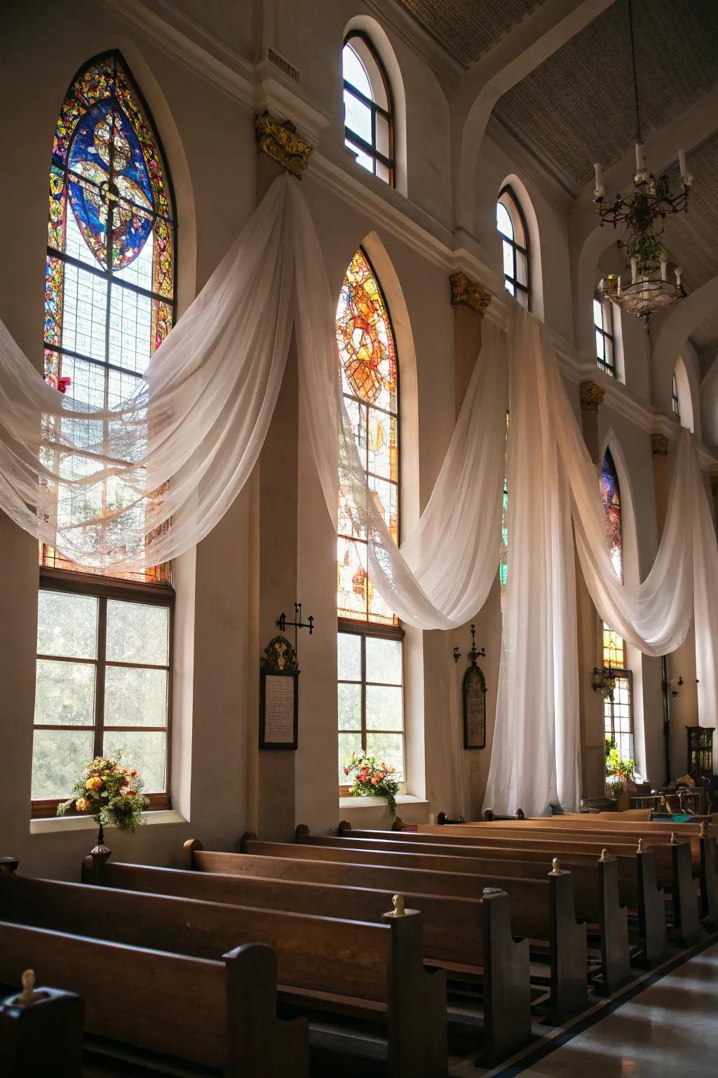 Chapel windows decorated with elegant diaphanous window hangings.