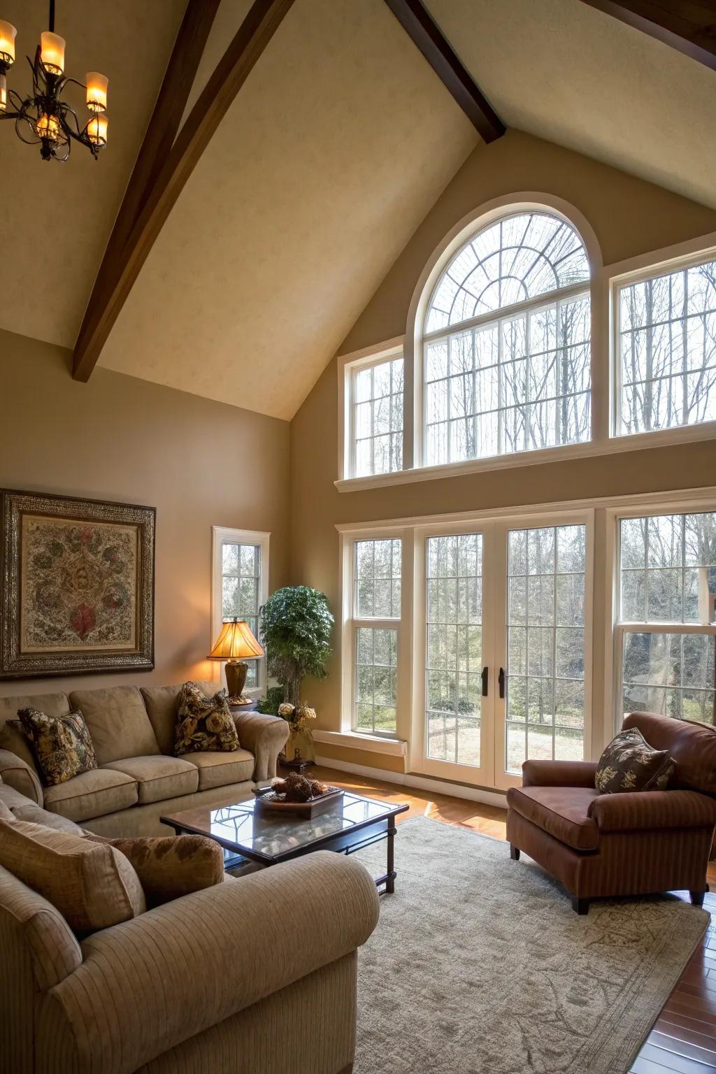 Living room with vaulted ceiling and large windows highlighting the feature wall