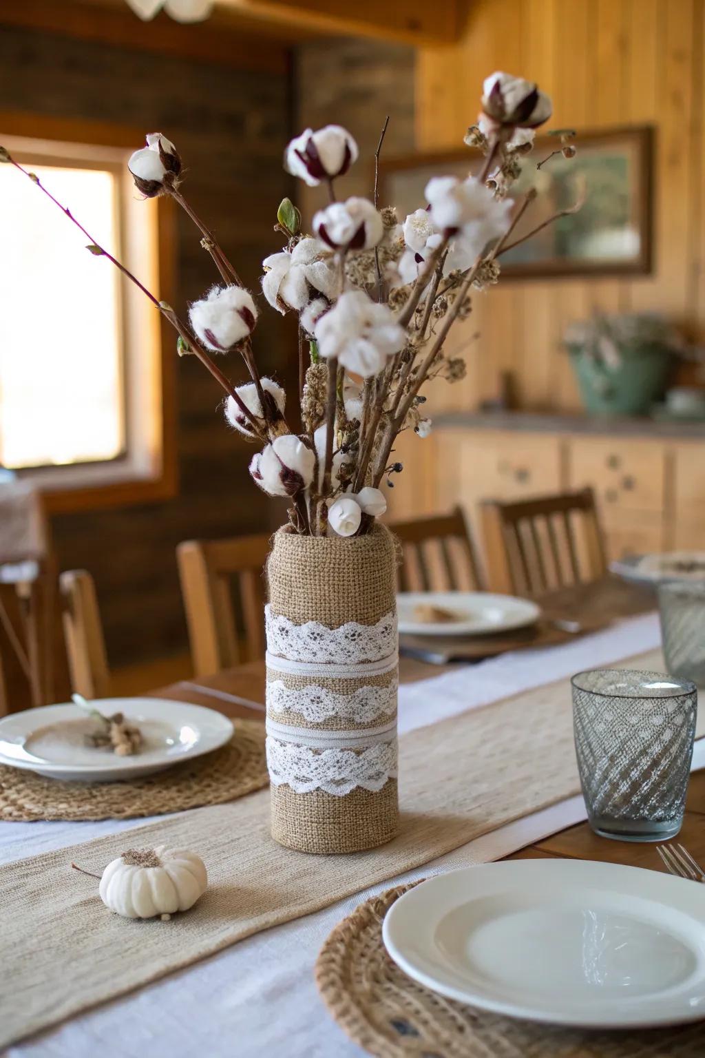 Farmhouse appeal with burlap, ribbon, and cotton sprigs.