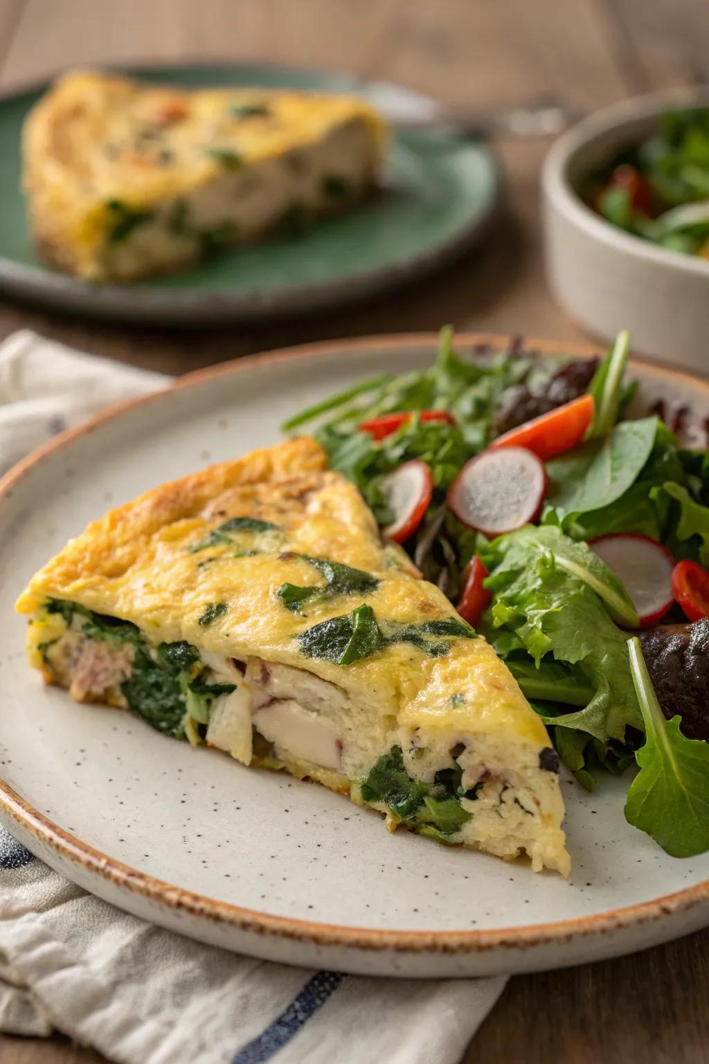 A savory turkey and spinach frittata with a fresh side salad.