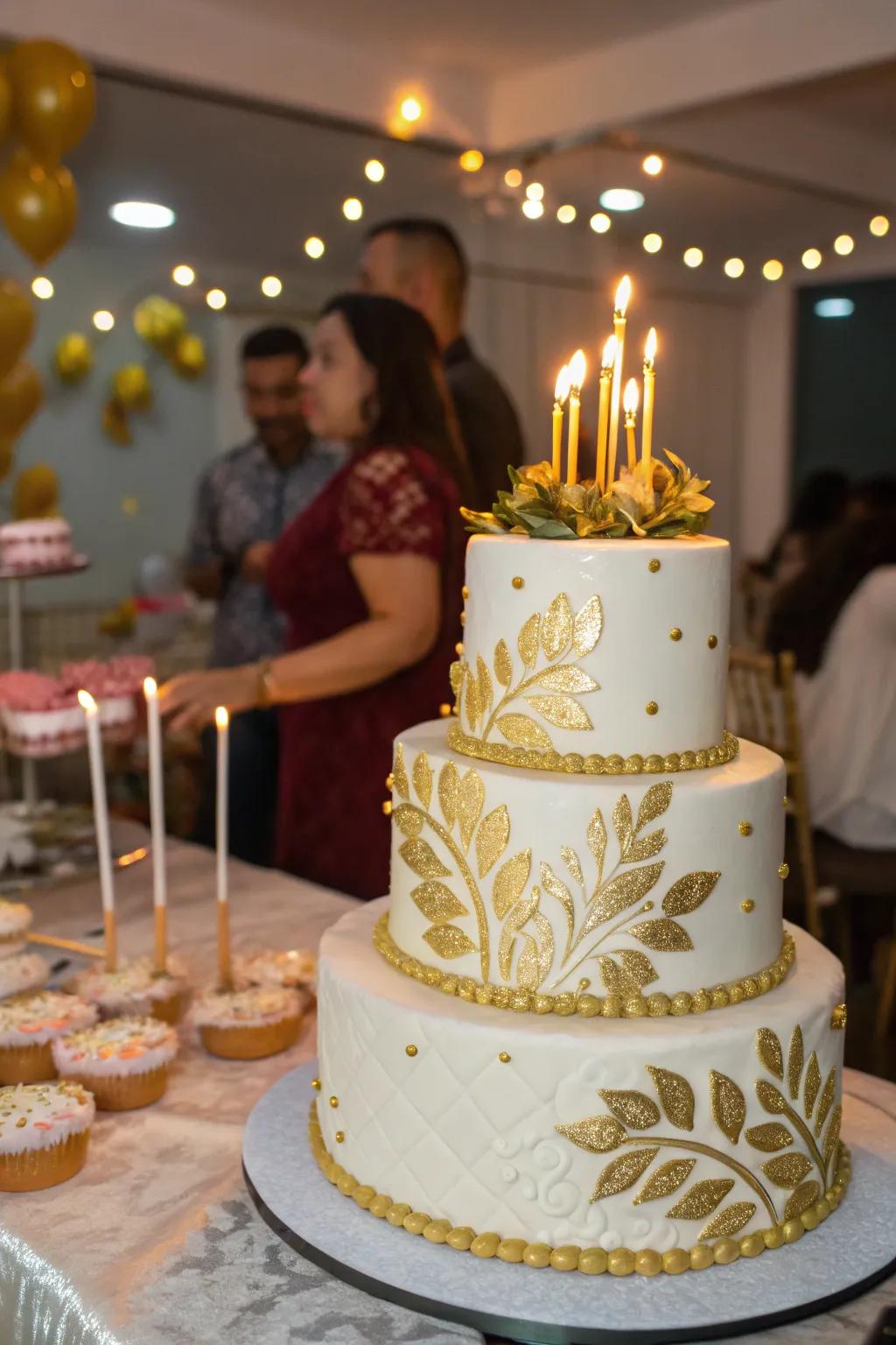 A beautiful multi-layered cake detailed with gold accents.