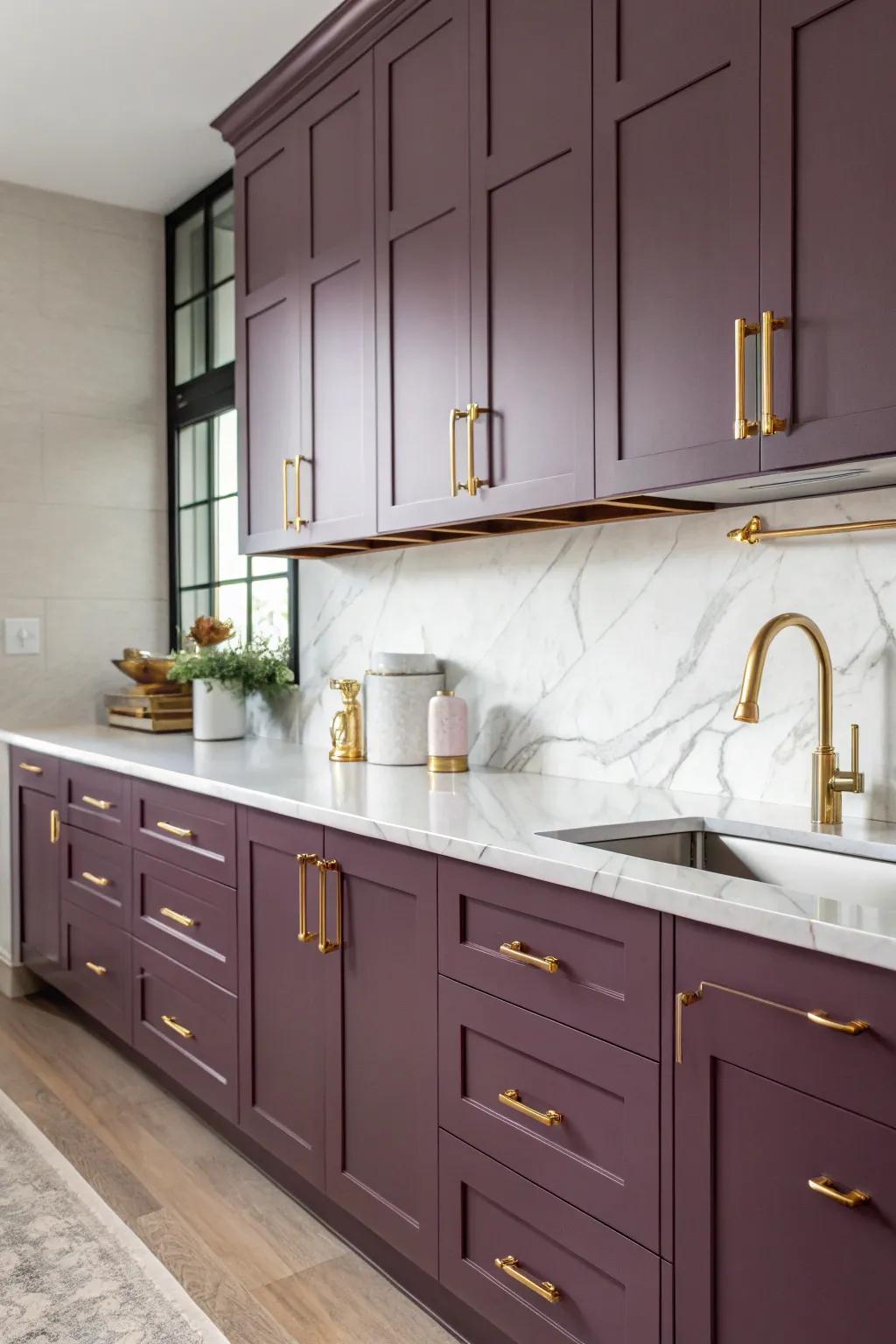 Deep plum finishes matched with gilded accents enrich the cooking area.