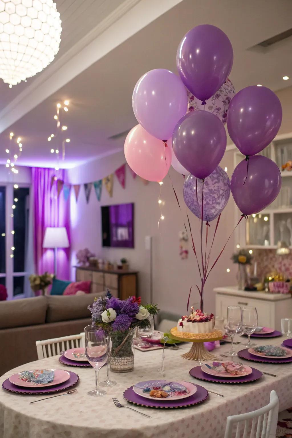 A festive celebration setup adorned with violet air-filled decorations and tableware.