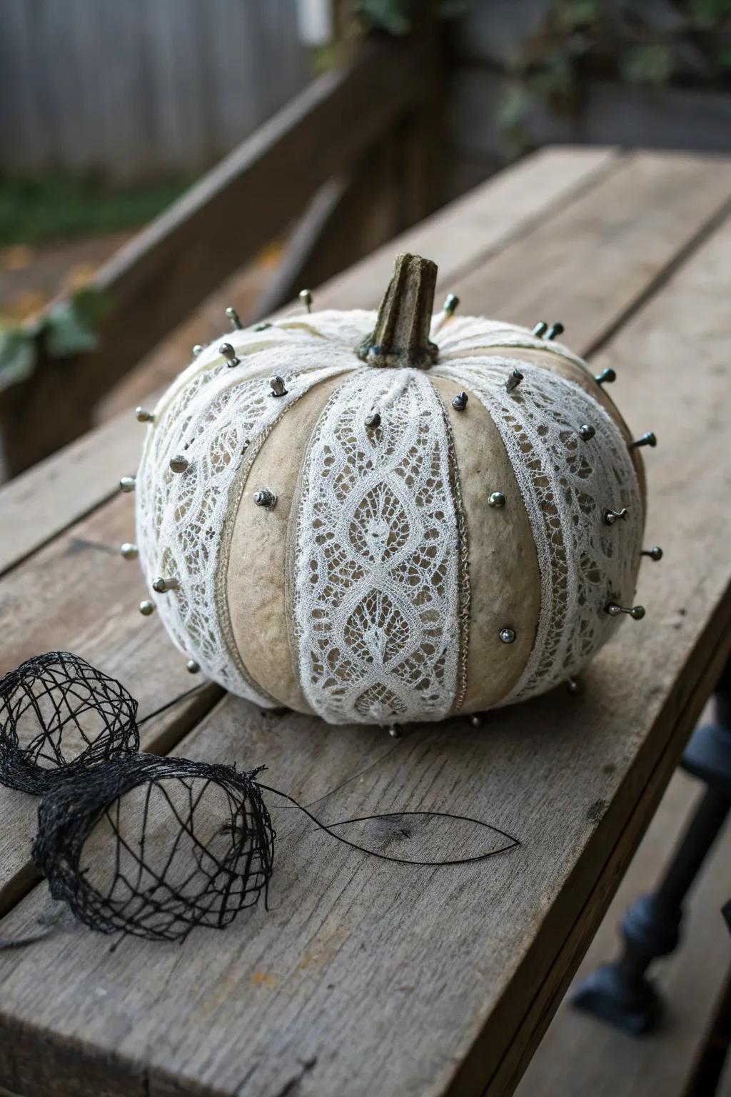 A pumpkin wrapped in lace for a vintage touch.