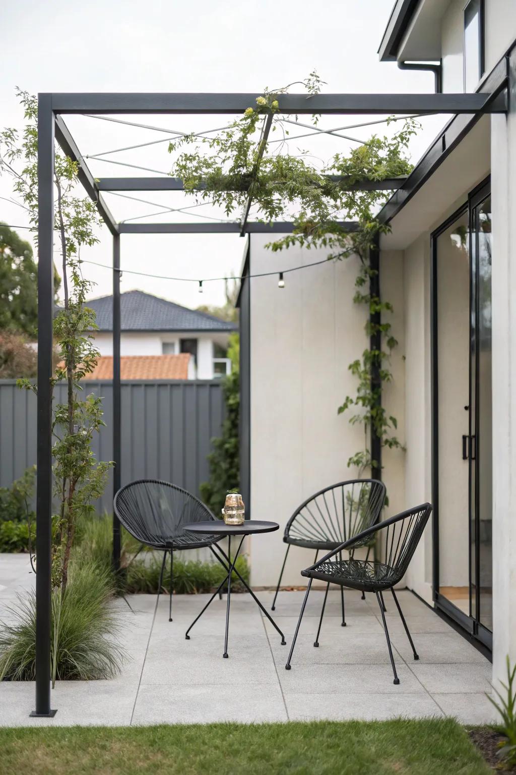 A minimalist metallic framework infuses modern refinement into a small patio.