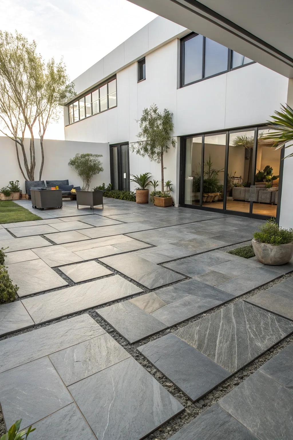 Choose large-format tiles to achieve a streamlined and modern courtyard.