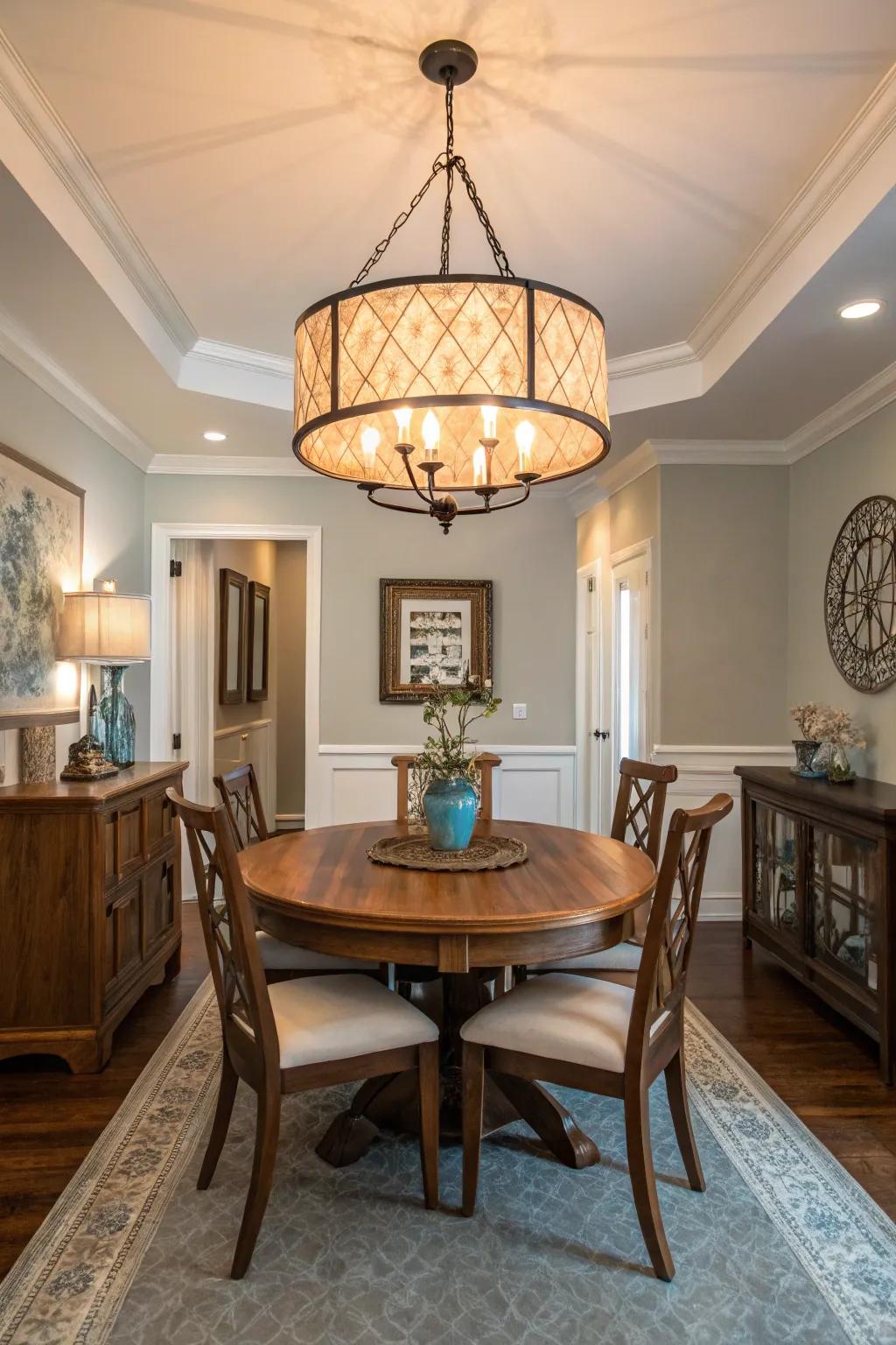 A statement light fixture becomes the focal point in a small dining room.