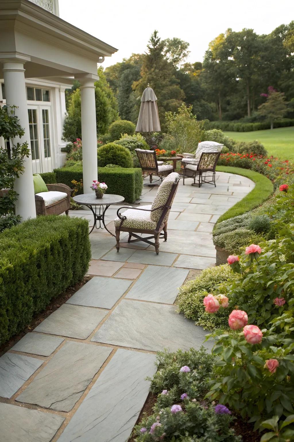 A tile path seamlessly connecting to a cozy outdoor living space.